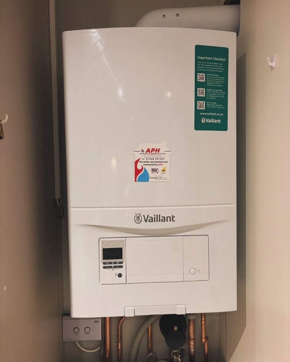 Advanced Plumbing & Heating team installing a new boiler in a Nottingham home, showcasing reliable plumbing services.